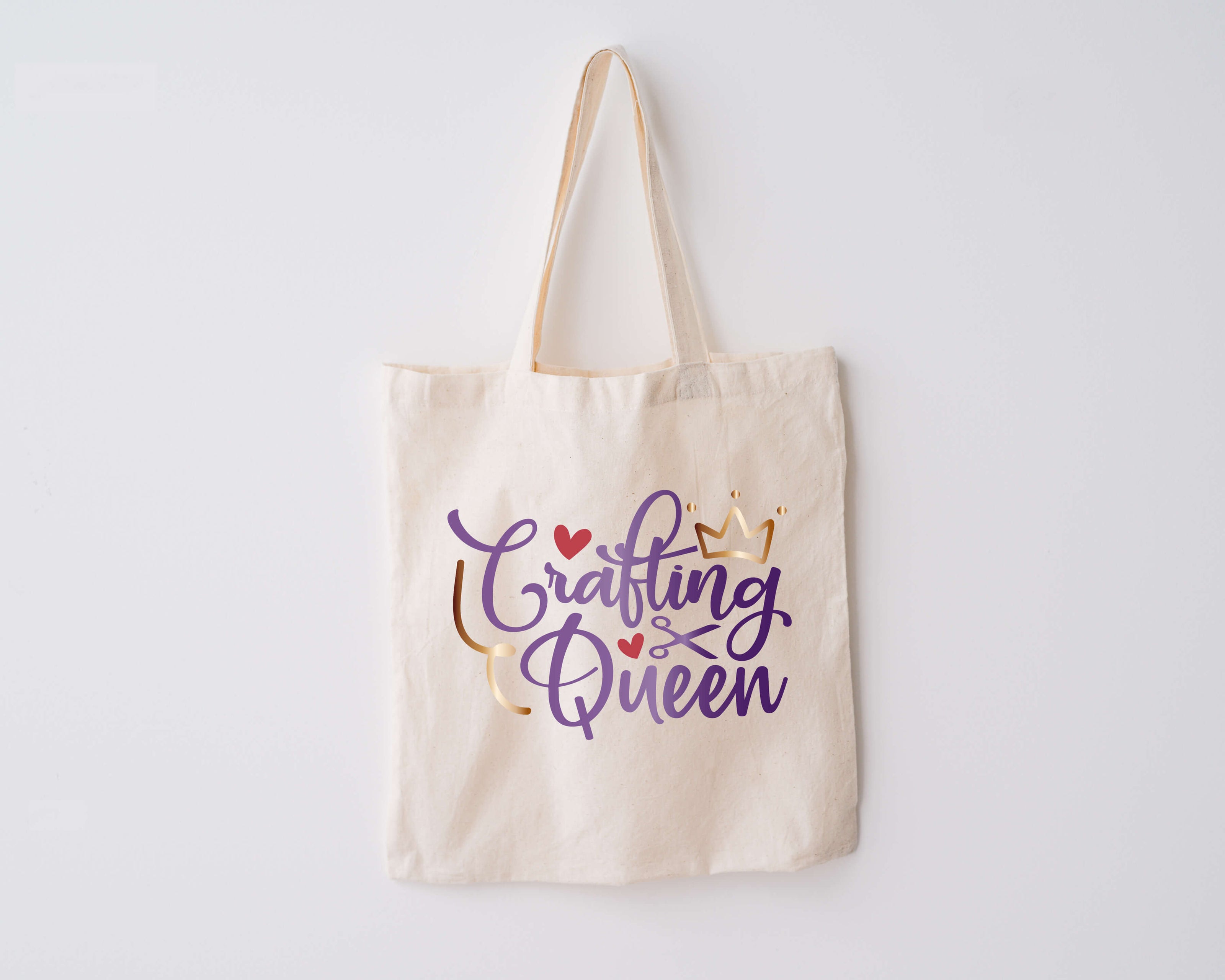 Canvas tote bag with phrase "Crafting Queen" on front